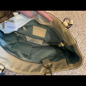 Patent “leather” ivory Coach purse